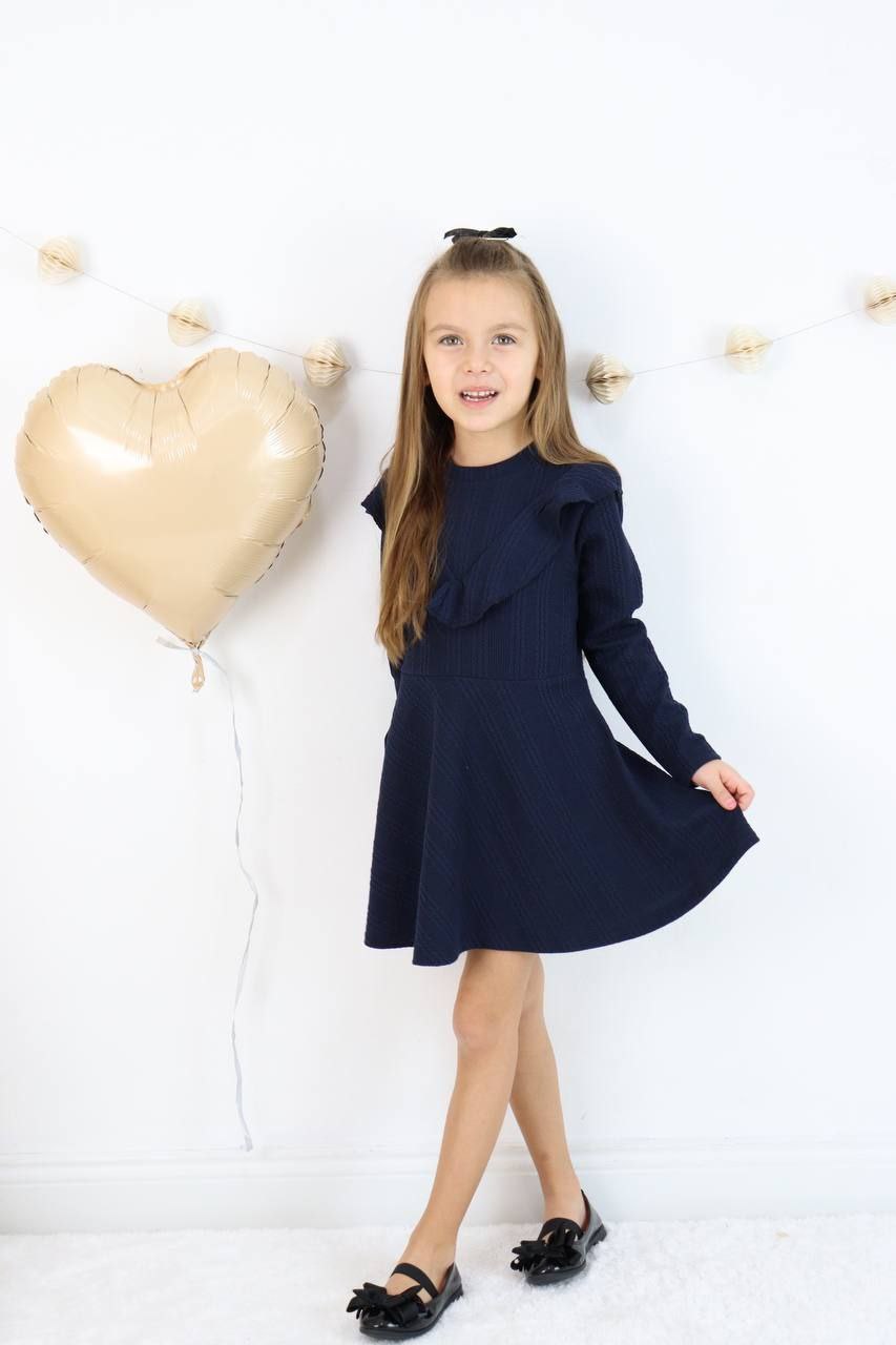 Robe Tricotée à Volants – Élégance et Confort pour Petites Princesses